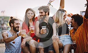 Group of friends having fun, traveling, smiling together outdoors