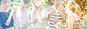 Group of friends having hamburgers and juice