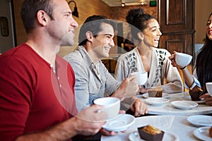 Group Of Friends Meeting In Cafe Restaurant