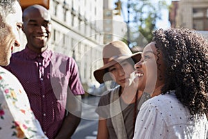 Group Of Friends Meeting On Urban Street In New York City