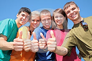 Group of friends in multicolor shirts