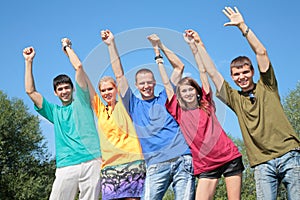 Group of friends in multicolor shirts