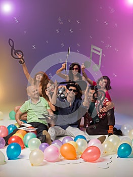 Group of friends with musical notes and balloons