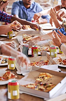 Group, friends and party with pizza, beverage and diversity for joy or fun with youth. People, soda and fast food with