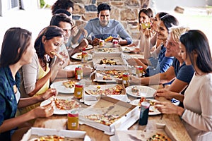 Group, friends and party with pizza, restaurant and diversity for joy or fun with youth. Men, Women and fast food with