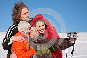 Group of friends photographs itself