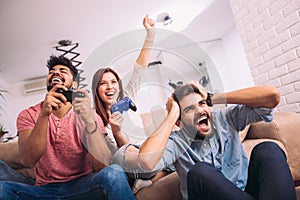 Group of friends play video games