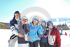 Group of friends with ski on winter holidays - Skiers having fun on the snow. selective focus