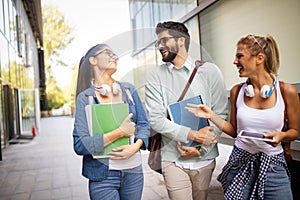 Group of friends studying together at university campus