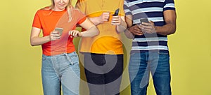 Group of friends using mobile smartphones. Teenagers addiction to new technology trends. Close up.