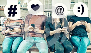 Group of friends using smartphones to communicate in social media. Concept of a generation of millennials who are online all the