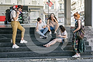 Group of friends using smartphones. Emotional isolation and technology depresion photo