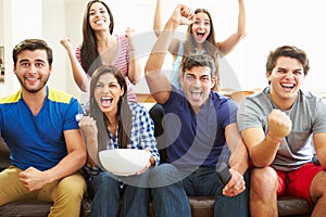 Group of Friends Watching Soccer Celebrating Goal