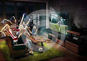 Group of friends watching TV, football, soccer match, sport games