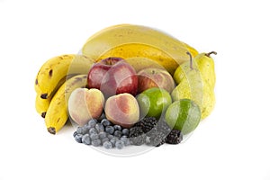 Group of fruits over white background. Bananas, papaya, apples, pears, peaches, blackberries, blueberries and lemons