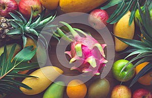 Group of fruits on wood table background.healthy concept