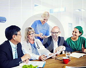 Group Of General Practitioners Having A Meeting