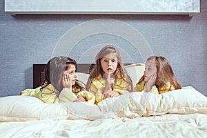 The group of girlfriends taking goog time on bed