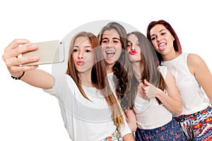 Group of girlfriends taking selfie.