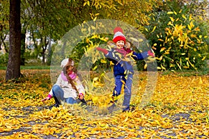 Group of girls in autumn park on the brench