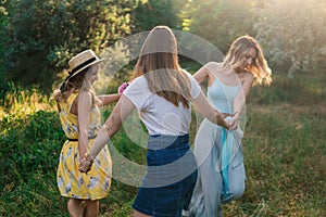 Group of girls friends making picnic outdoor