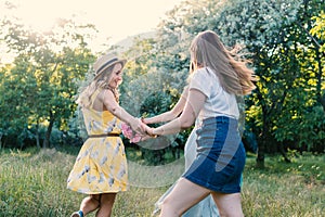 Group of girls friends making picnic outdoor