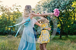 Group of girls friends making picnic outdoor