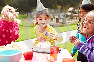 Group Of Girls Having Outdoor Birthday Party