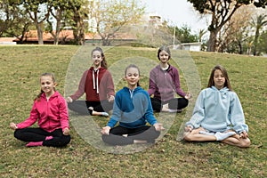 Group of girls practicing yoga