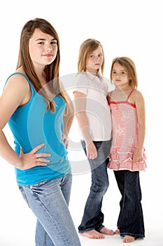 Group Of Girls Together In Studio Looking Unhappy