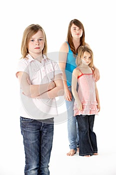 Group Of Girls Together In Studio Looking Unhappy