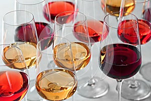 Group of glasses with different wines photo