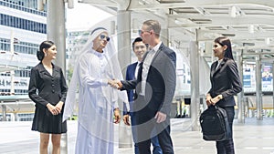 Group of global business people man and woman shake hand