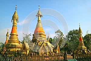 Group of Golden Pagodas of Wat Somdej Temple in Sangkhlaburi, Kanchanaburi, Thailand