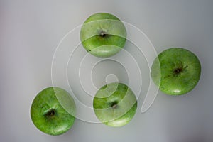 Group of green apples frome the top. Organic fresh fruits and image of autumn harvest