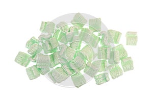 Group of green packing peanuts on a white background