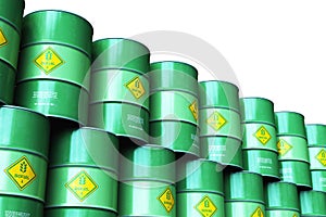 Group of green stacked biofuel drums isolated on white background