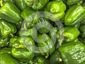 Group of green sweet pepper in supermarket