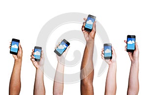 Group of Hand Holding Digital Devices with Cloud Symbol