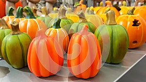 Group of hand painted colorful decoration clay pumpkins for Halloween
