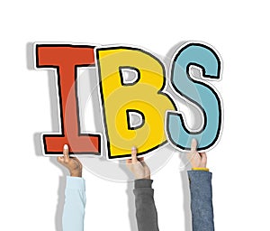 Group of Hands Holding IBS Letter photo