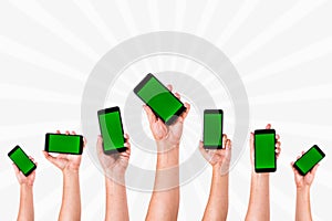 group of hands Raising up Smart phones against white background - Hands holding phones