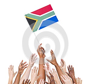 Group of Hands Reach the South Africa Flag