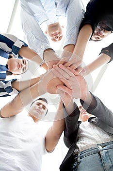 Group of hands together of young businesspeople. Stack of coordination hands Success Teamwork under viwe