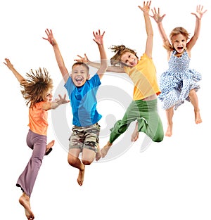 Group of happy barefeet cheerful sportive children jumping and dancing