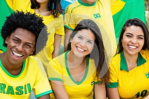 Group of happy brazilian soccer fans