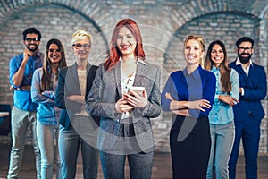 Group of happy business people and company staff in modern office