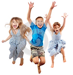 Group of happy cheerful sportive children jumping and dancing
