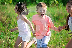 Group of happy children playing