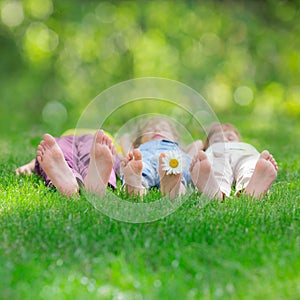 Group of happy children playing outdoors